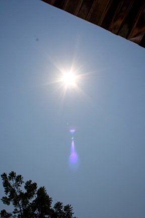 While you can't see the ring, that partial white orb is actually projection of the eclipse